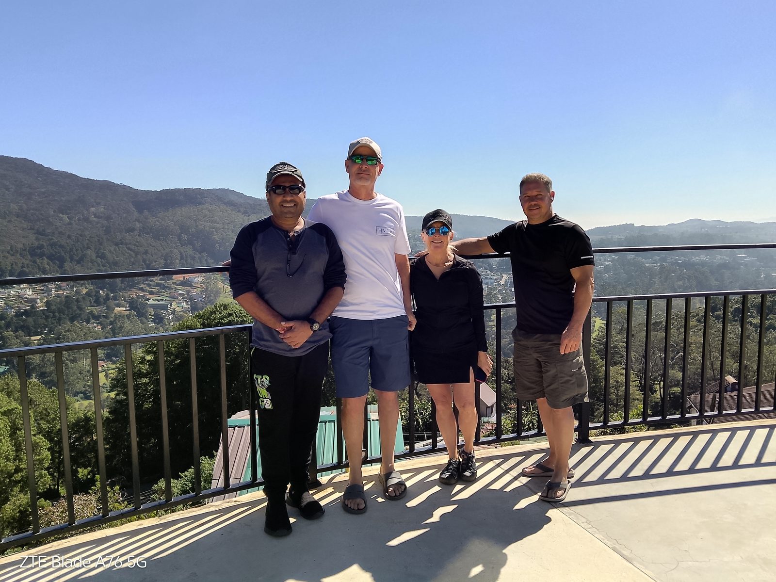 Travelers at a Sri Lanka hill country viewpoint